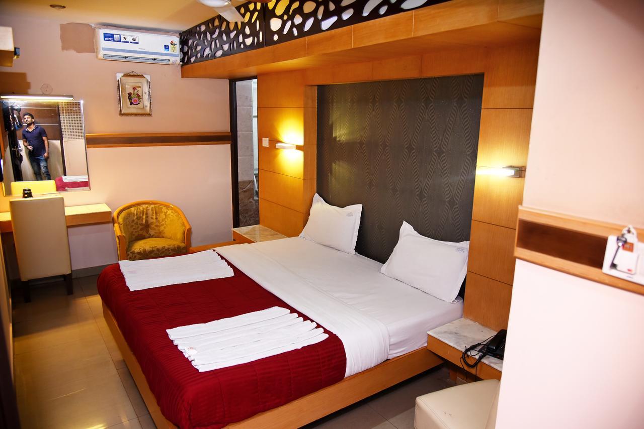 Grand Choice Otel Bangalore Oda fotoğraf