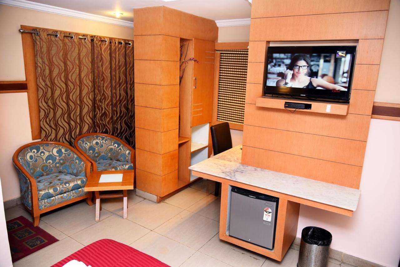 Grand Choice Otel Bangalore Oda fotoğraf